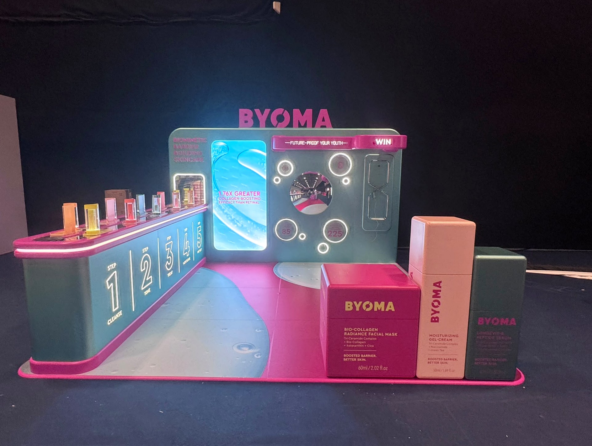 BYOMA branded experiential activation, complete with illuminated counters and product displays