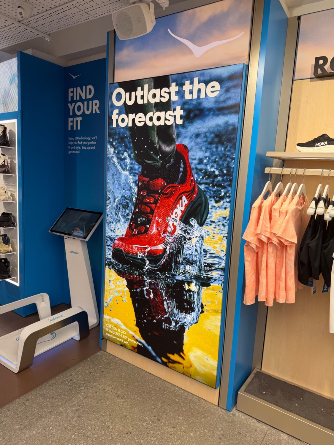 HOKA campaign graphic in retail store